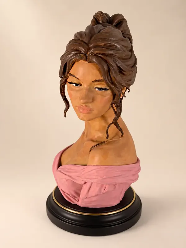 Hand-painted bust of a woman with an updo, front view